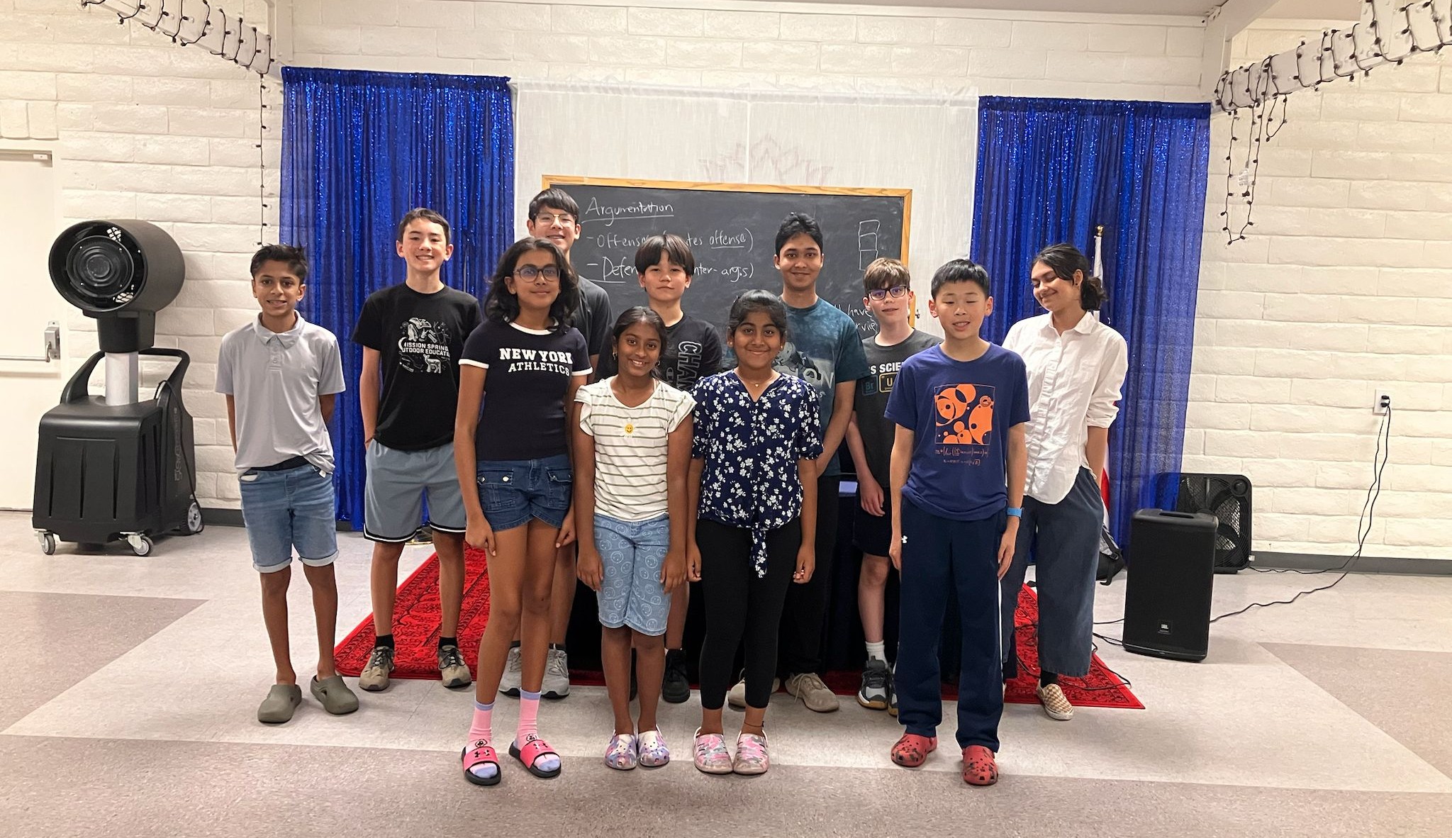 Middle school students engaging in debate activities
