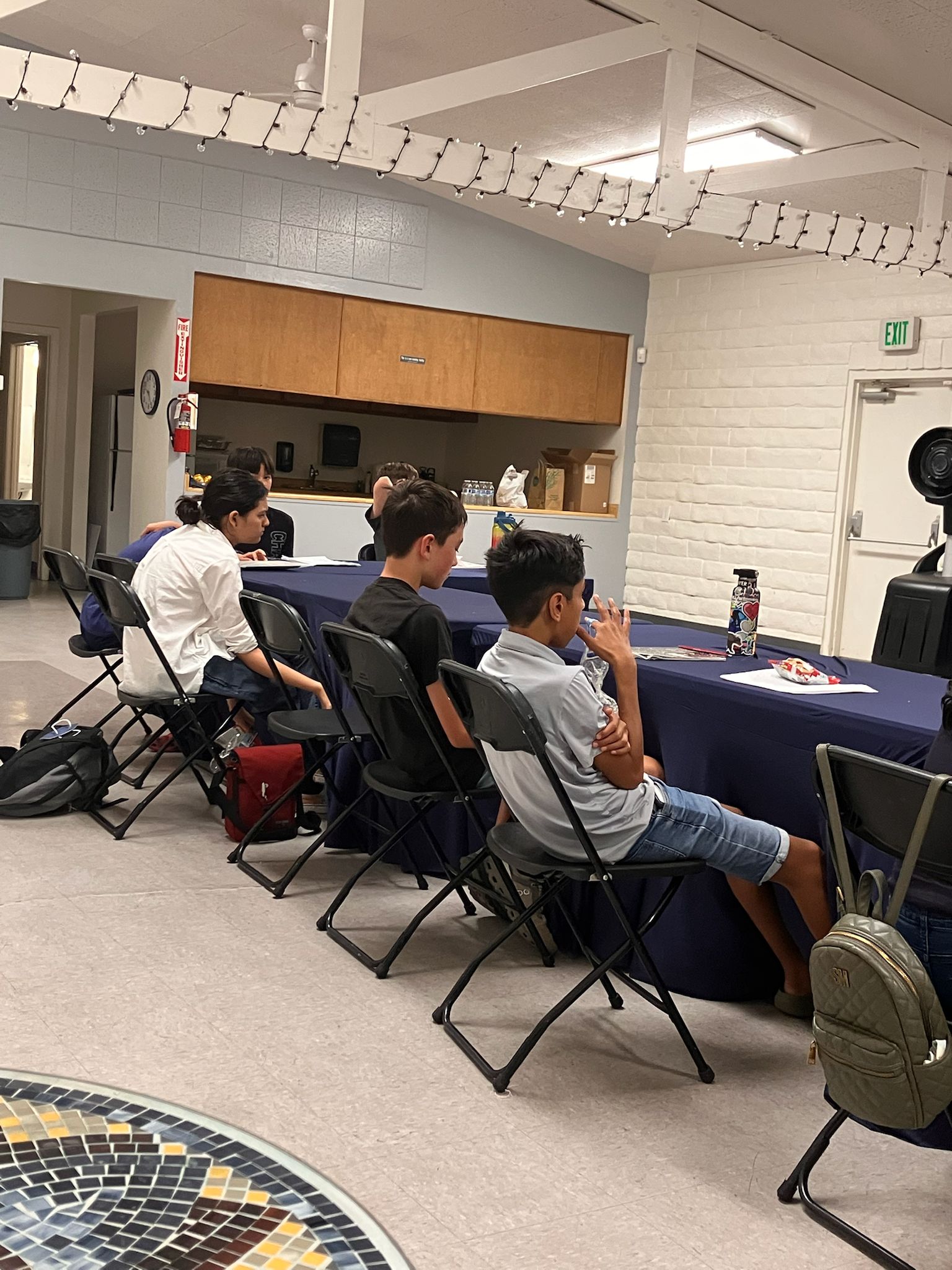 Interactive group discussion during summer camp